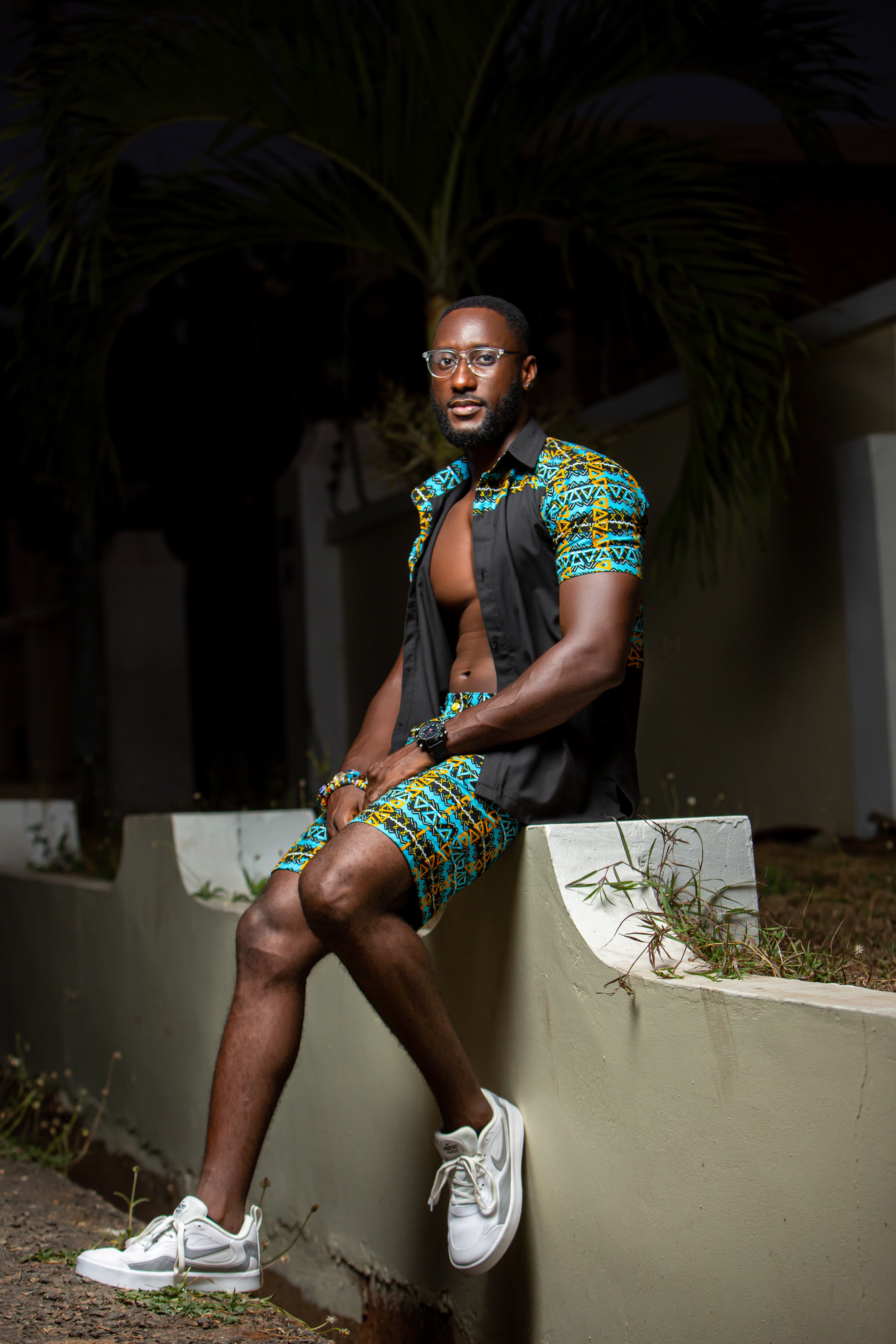 Teal Geometric Shorts — night seated